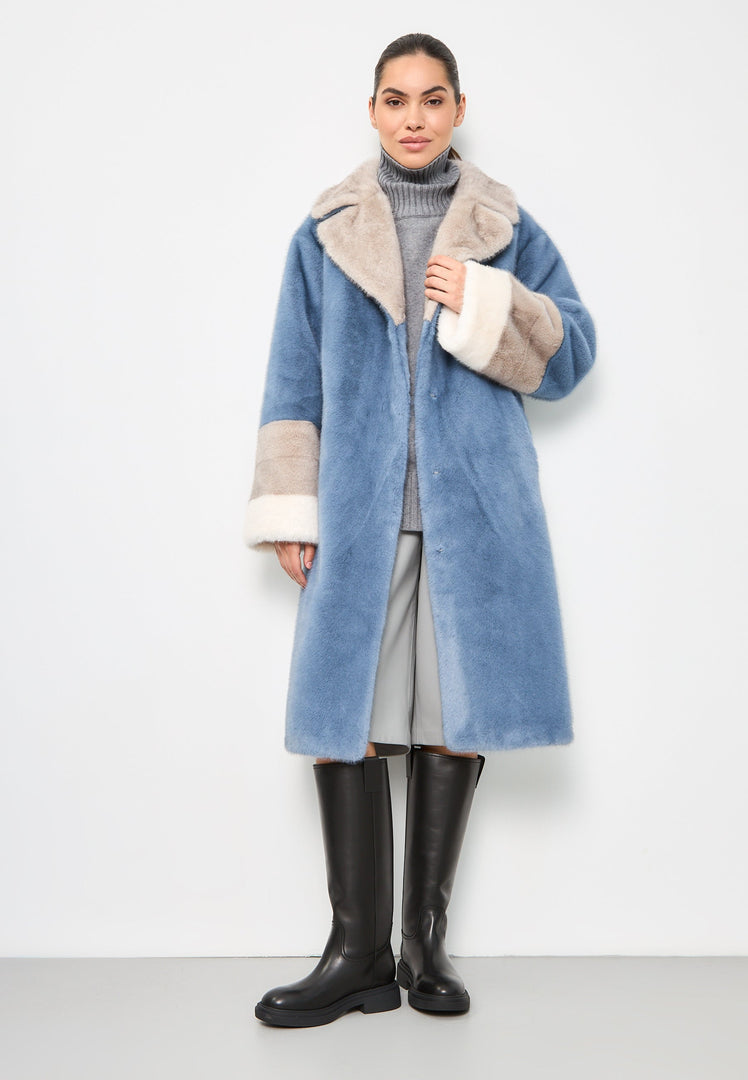 Stay stylish and cozy in this luxurious blue faux fur coat adorned with sparkling crystal embellishments - the perfect choice for elegant winter fashion.