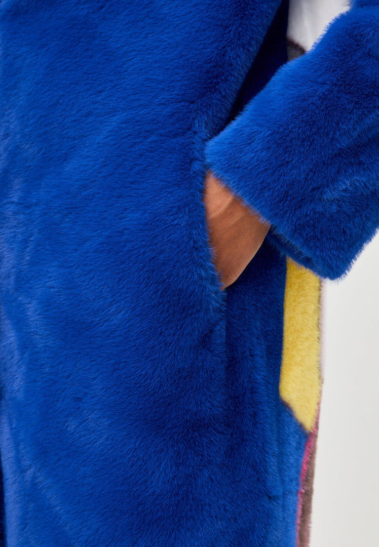 A stylish long back print coat in blue, perfect for deluxe coat lovers and a must-have for long coat fashion enthusiasts. Ideal for stylish women looking to make a statement.