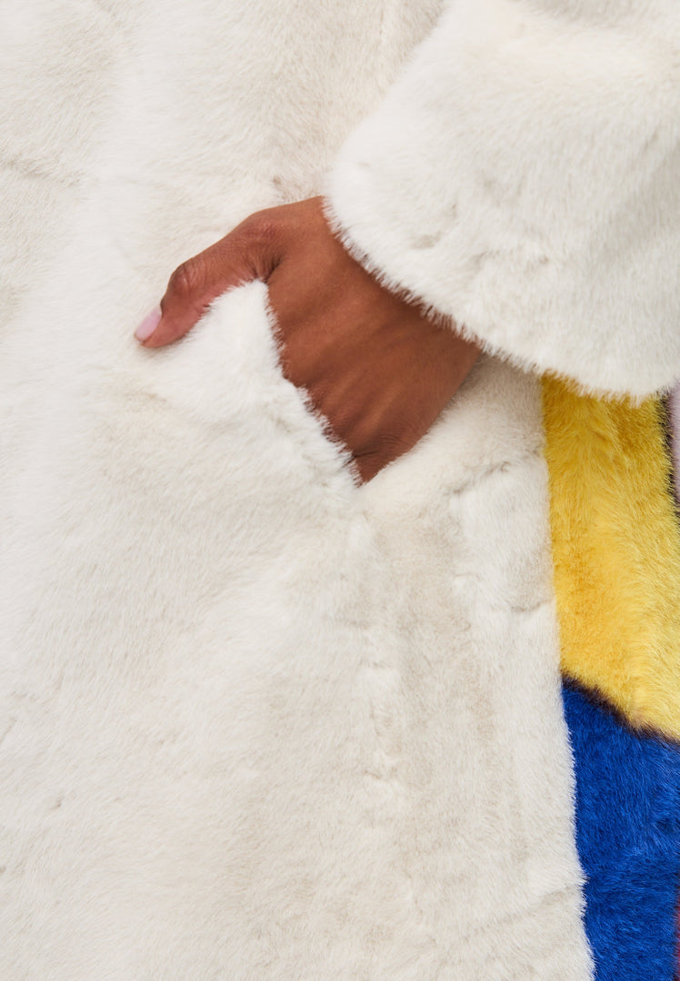 A stylish white long back coat with deluxe print, perfect for coat lovers and long coat lovers alike