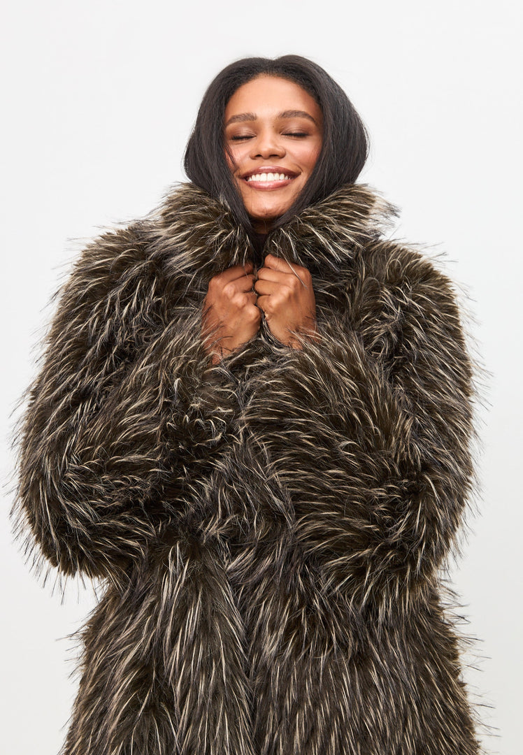 A stylish and luxurious brown faux fur coat from the North, perfect for those seeking a high-end designer look.