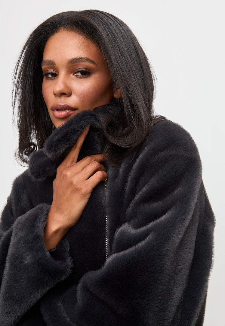 A trendy black Diana faux fur winter coat, a fashionable outerwear essential.