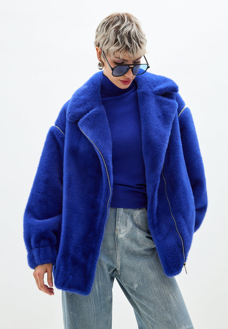 A stylish blue faux fur short coat inspired by Marilyn Monroe's timeless fashion, perfect for outerwear fashion enthusiasts.