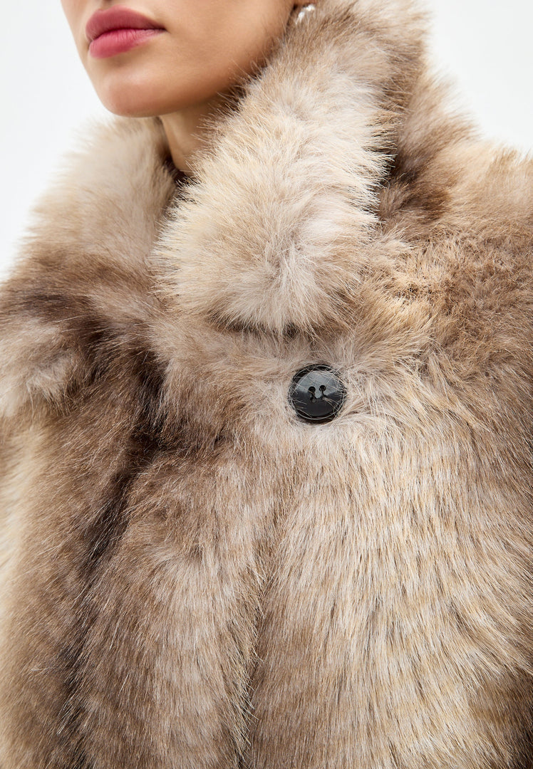 A stylish and luxurious brown faux fur coat, the Natalie coat - designer outerwear for a chic look.