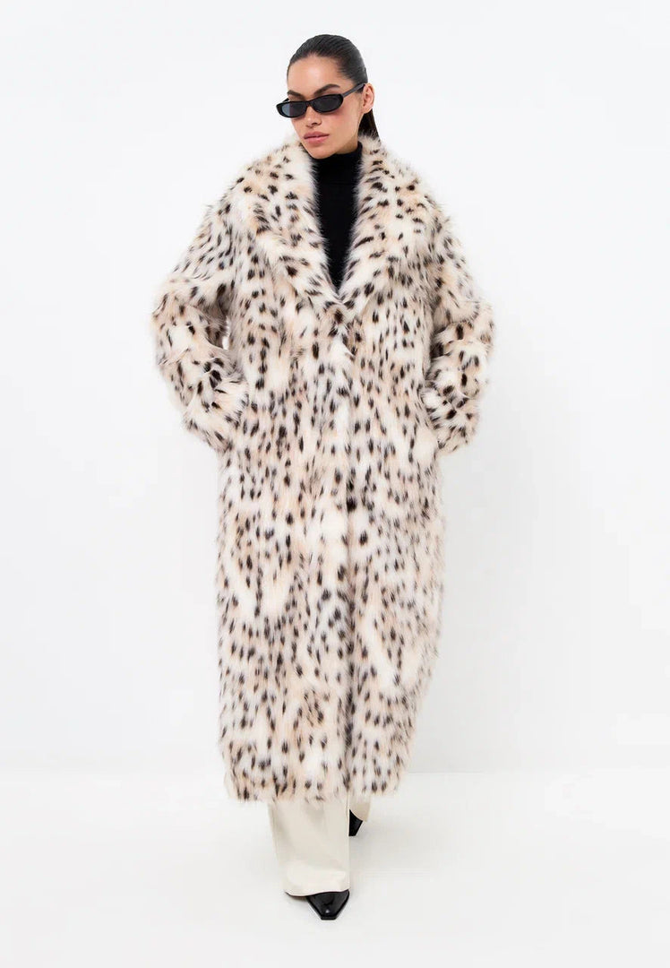A stylish faux fur spotted coat, the epitome of luxe winter fashion.