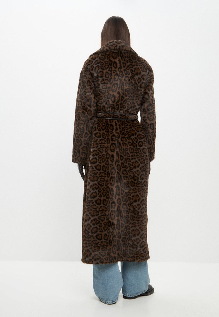 Stay warm and stylish this winter with a reversible faux fur coat perfect for cold weather outings.