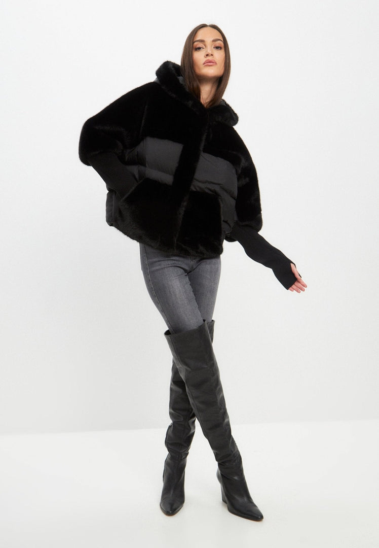 A trendy oversized black faux fur jacket for women, perfect for stylish plus size outerwear fashion.