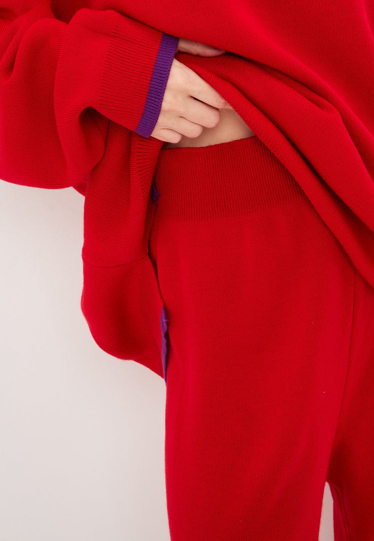 A cozy and stylish oversized jogger set in red, perfect for plus size activewear or a comfy athleisure look with oversized sweatpants outfit.