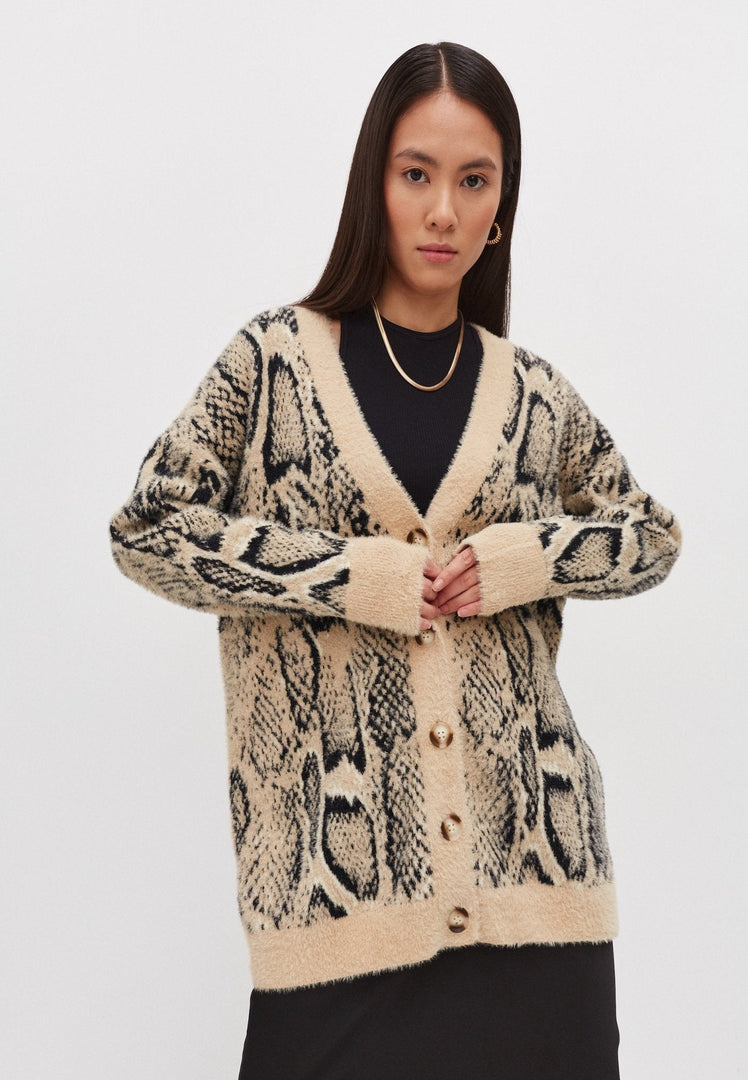 A cozy and stylish oversized chunky knit cardigan for women.