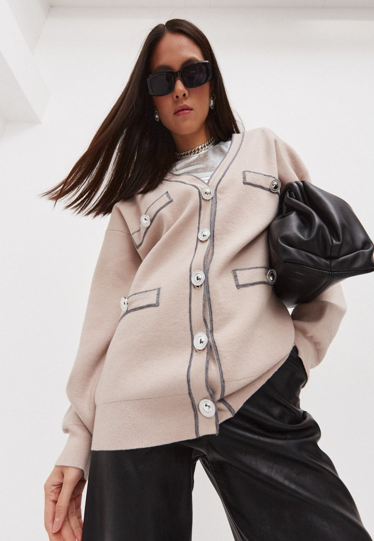 A fashionable, elegant, and cozy knit cardigan for a stylish and luxurious look.