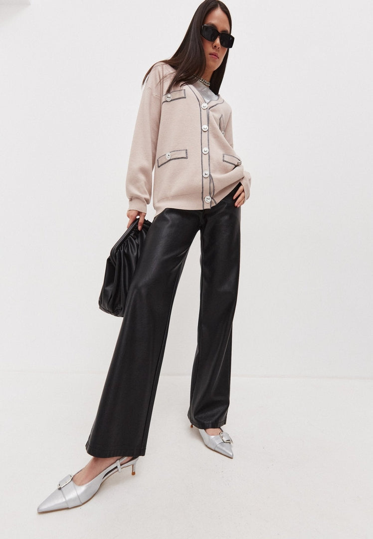 A cozy and fashionable knit cardigan, perfect for adding elegance and style to your wardrobe.