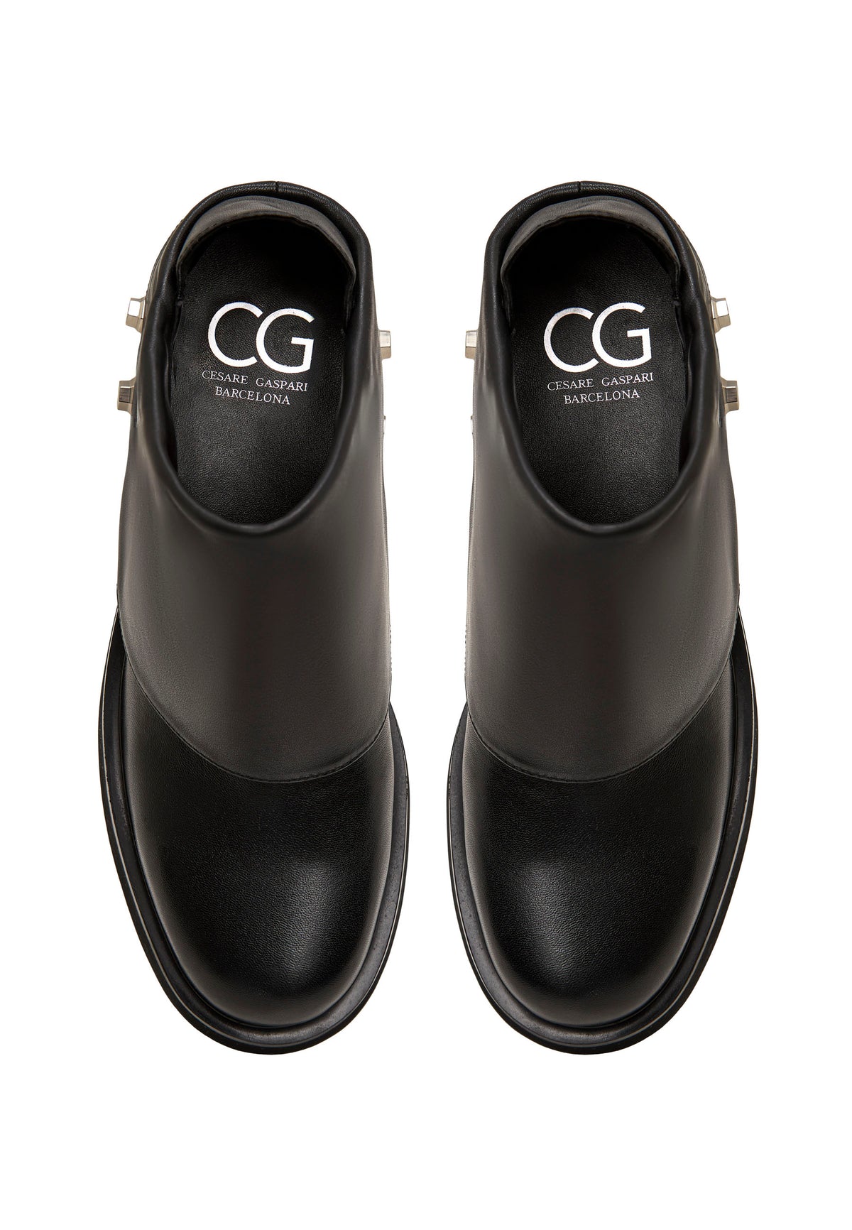 Mules de piel con tacón escultural – Negro