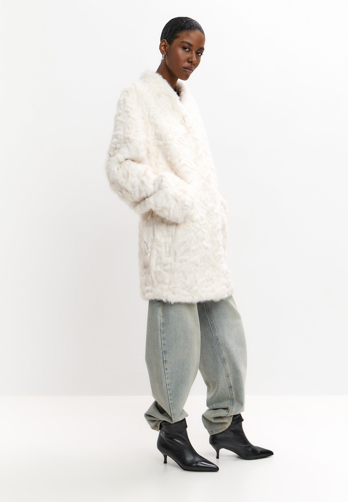 Manteau oversize en fausse fourrure laiteuse