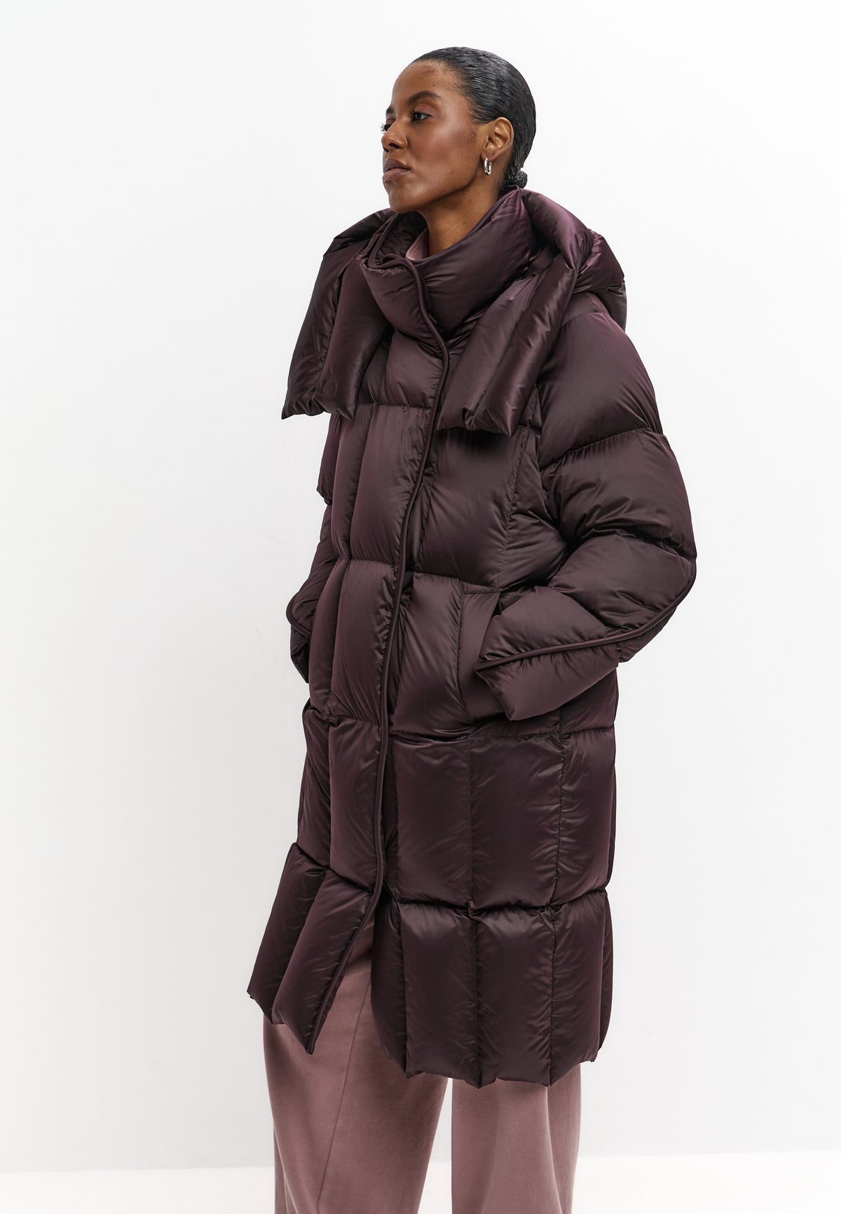 Lange oversized gewatteerde jas met capuchon – Donkerpaars
