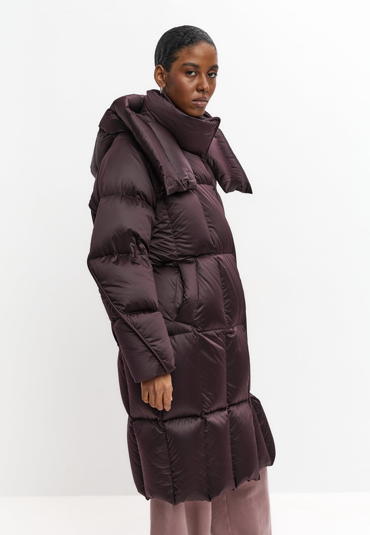 Lange oversized gewatteerde jas met capuchon – Donkerpaars