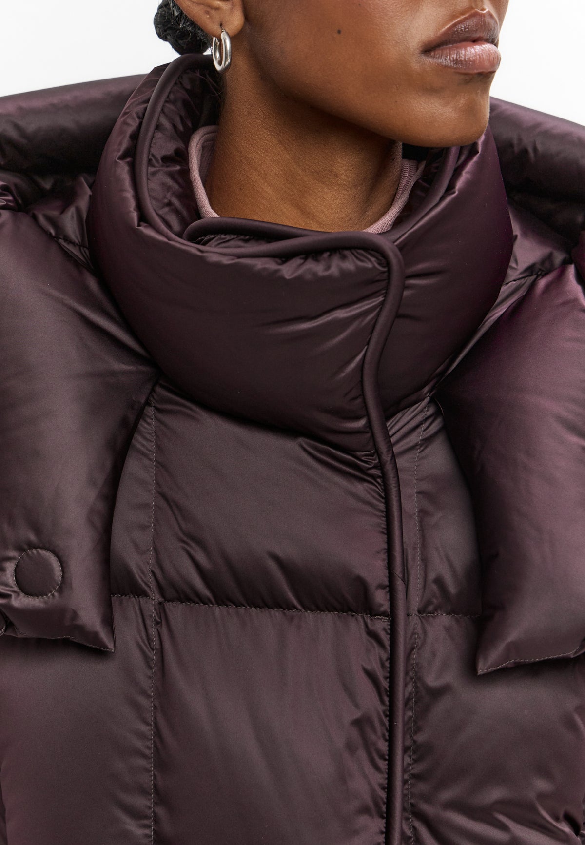 Lange oversized gewatteerde jas met capuchon – Donkerpaars