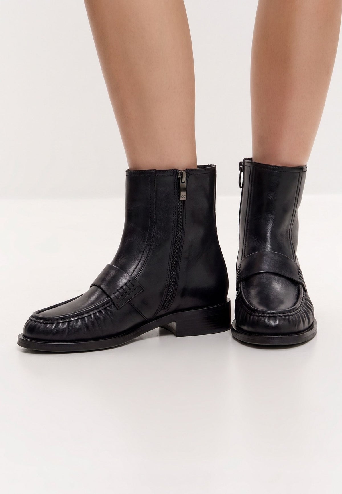Bottines à bout mocassin en cuir – noir