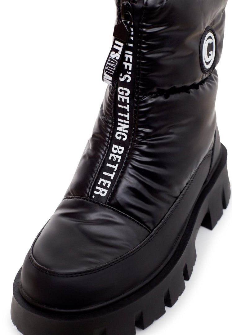 Stay stylish and cozy this winter with these trendy black winter boots - the perfect addition to your winter fashion footwear collection.
