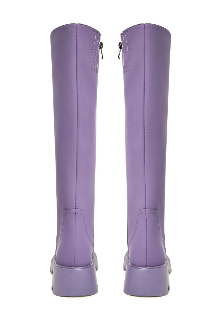 A stylish pair of chunky sole knee-high lilac boots, perfect for women's fashion with a trendy twist.