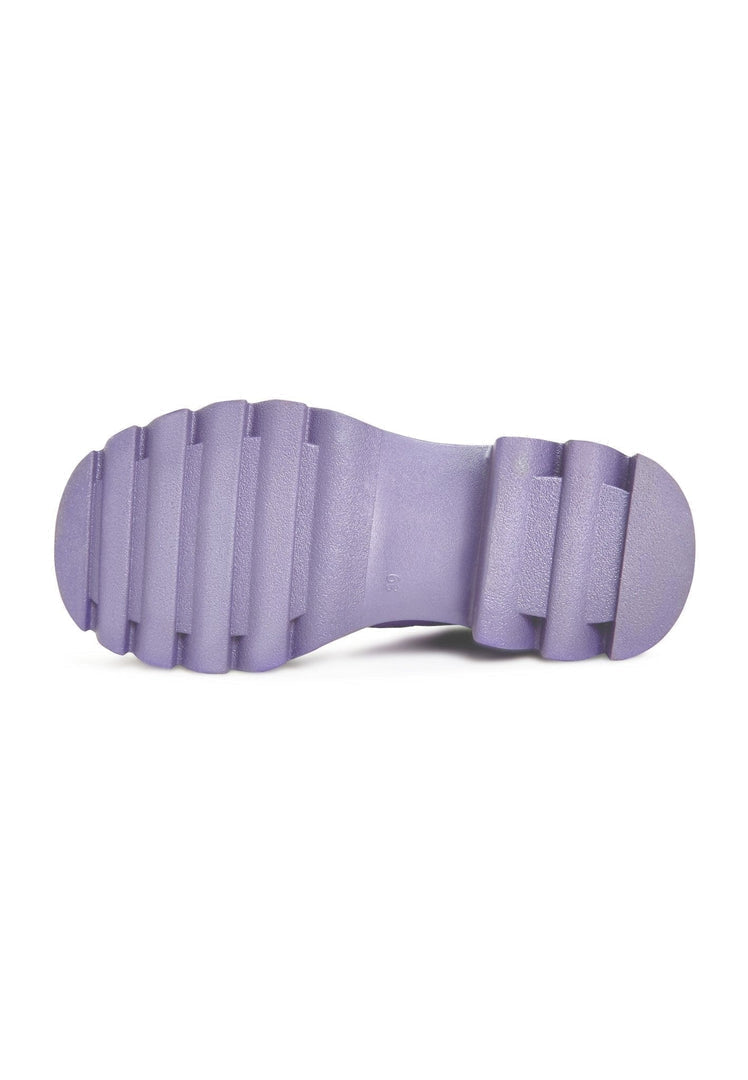 A pair of chunky sole knee-high lilac boots, the perfect addition to any women's fashion wardrobe for trendy footwear looks.