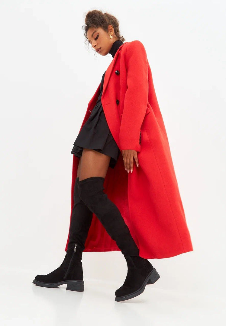 A stylish pair of women's over-the-knee suede boots, the perfect chic and fashionable addition to any outfit.