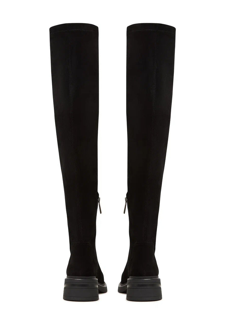 A trendy pair of over-the-knee suede boots, the perfect chic fashion statement in women's footwear.