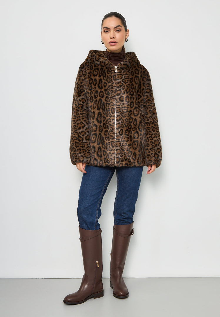 A trendy women's faux fur jacket with a hood, featuring a stylish leopard print design known as the Reyna leopard jacket, perfect for fashionable outerwear.