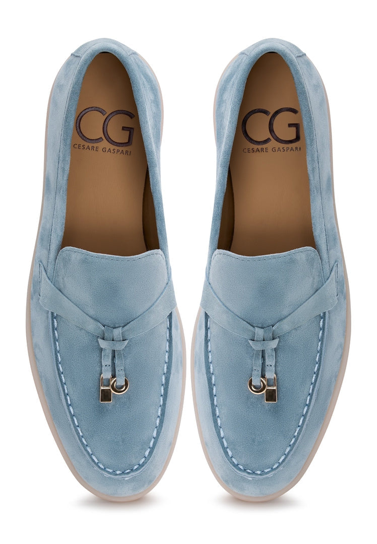 A pair of stylish blue platform moccasins by Aurelia Shoes for women, perfect for a fashionable and comfortable look.