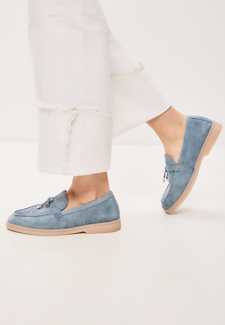 A pair of stylish blue platform moccasins by Aurelia shoes for women.