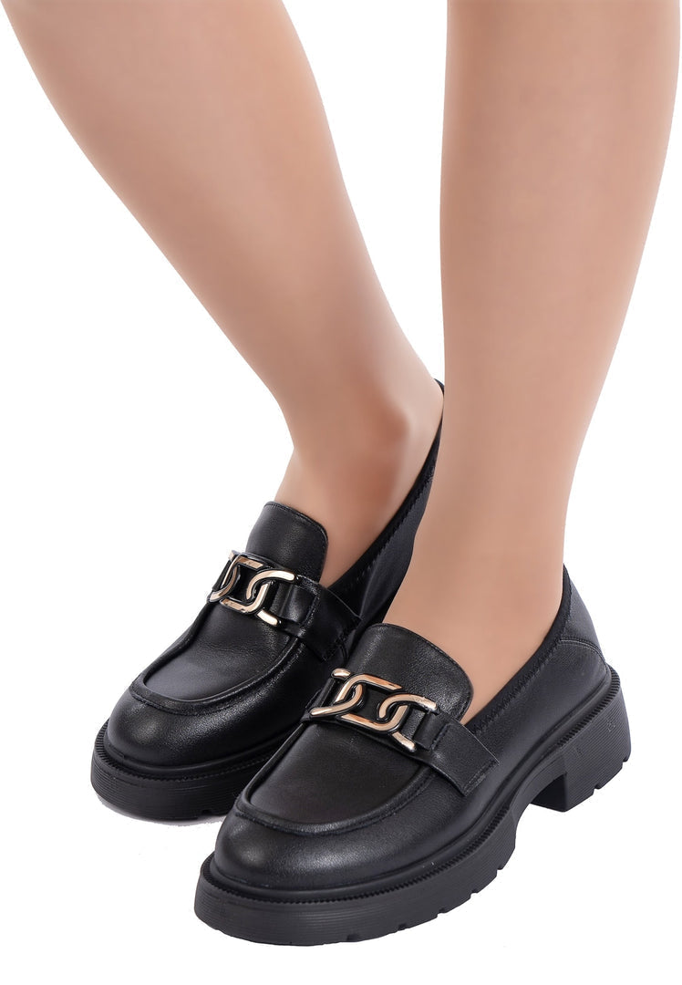 A stylish pair of Juana platform loafers in black, ideal women's footwear featuring designer flats.