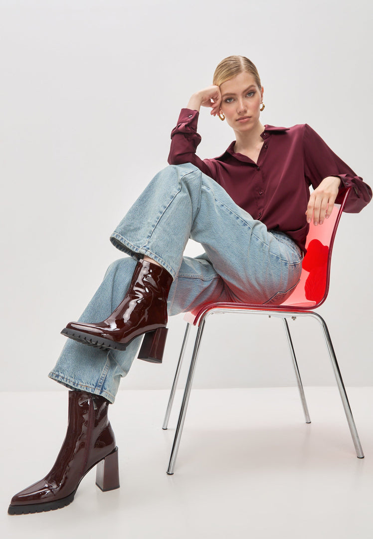 A stylish pair of red Helen block heel boots for women - fashion footwear essential.