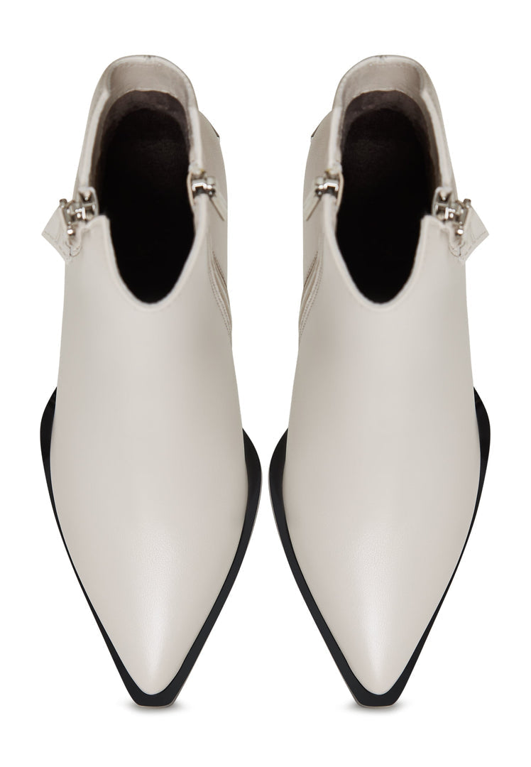 A pair of chic designer leather ankle boots in classic beige, the essential fashion boots for women's footwear.
