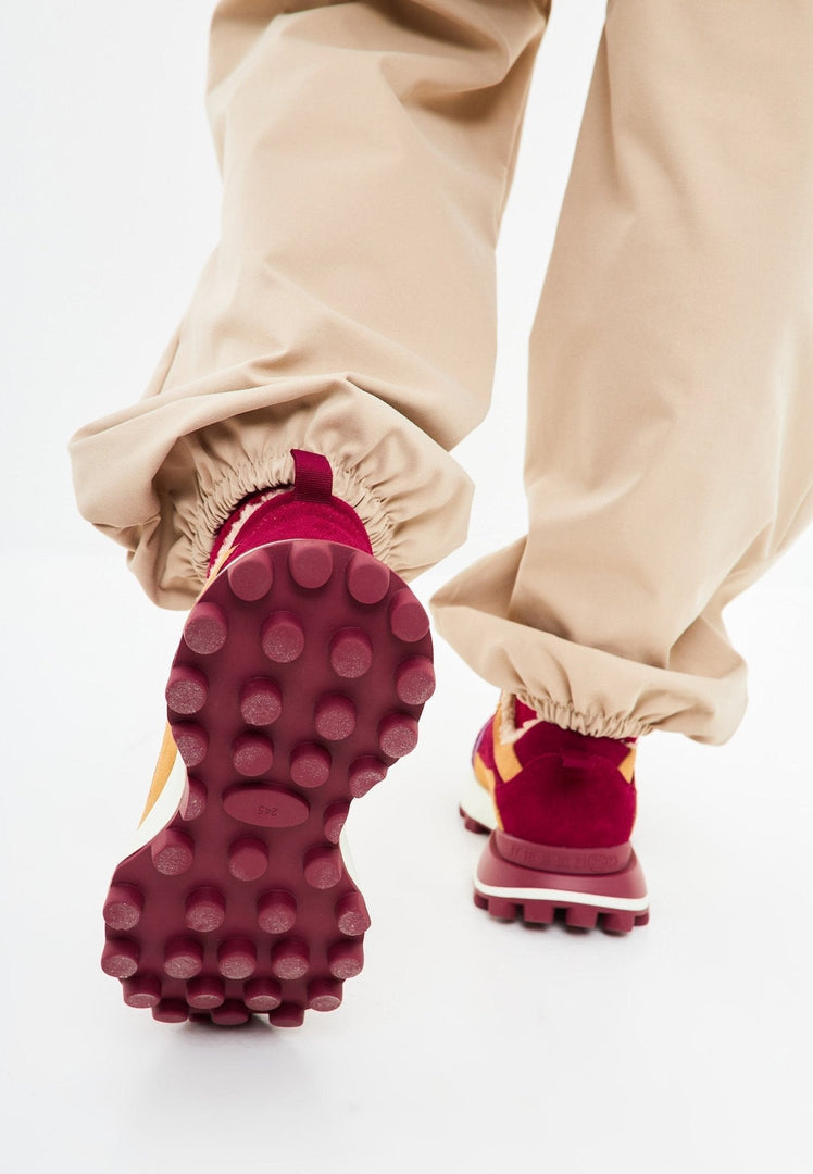 A stylish pair of women's platform shoes in Bordeaux, featuring chunky platform heels for a fashion-forward look.