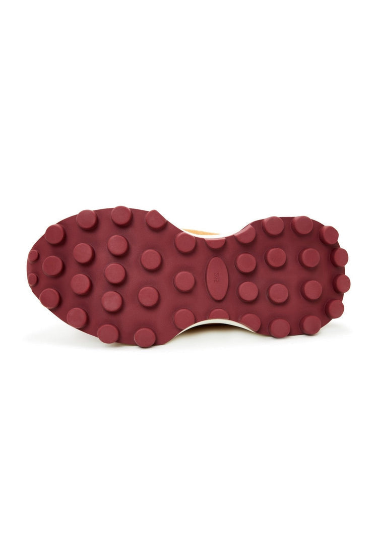 A trendy pair of chunky platform Bordeaux sneakers for women, featuring a stylish chunky heel and fashionable design.