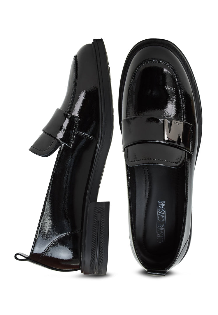 A stylish pair of black block heel loafers for women - perfect combination of fashion and comfort.