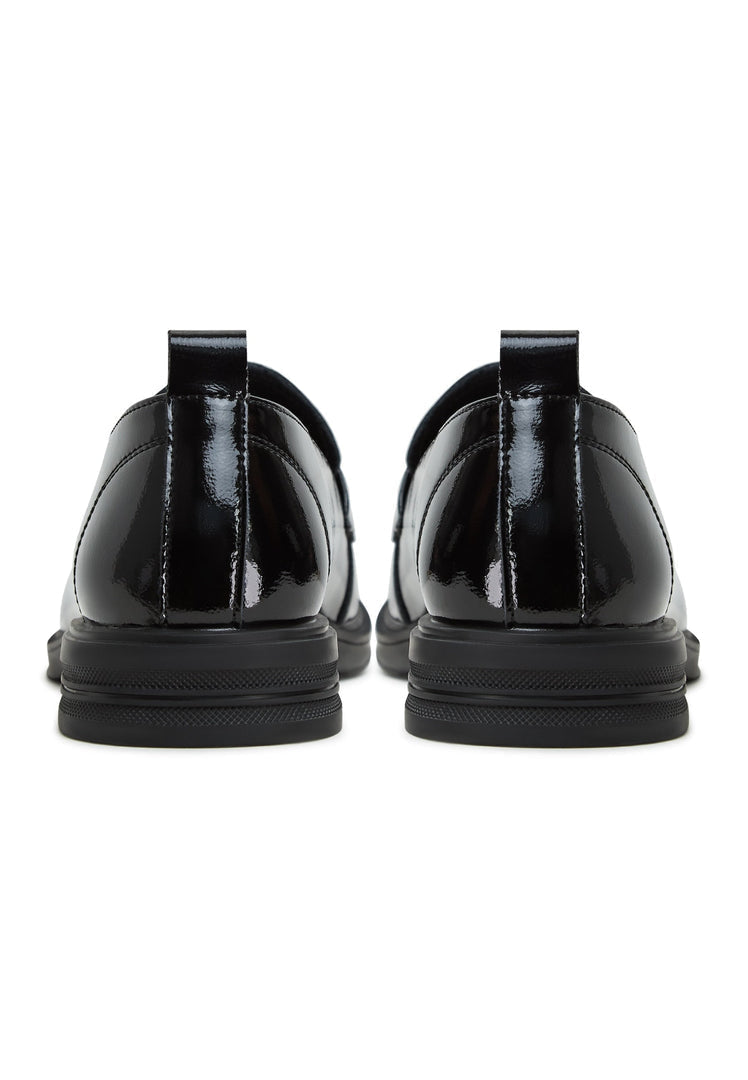 A stylish and classic pair of black block heel loafers for women, perfect for adding fashion and comfort to any outfit.