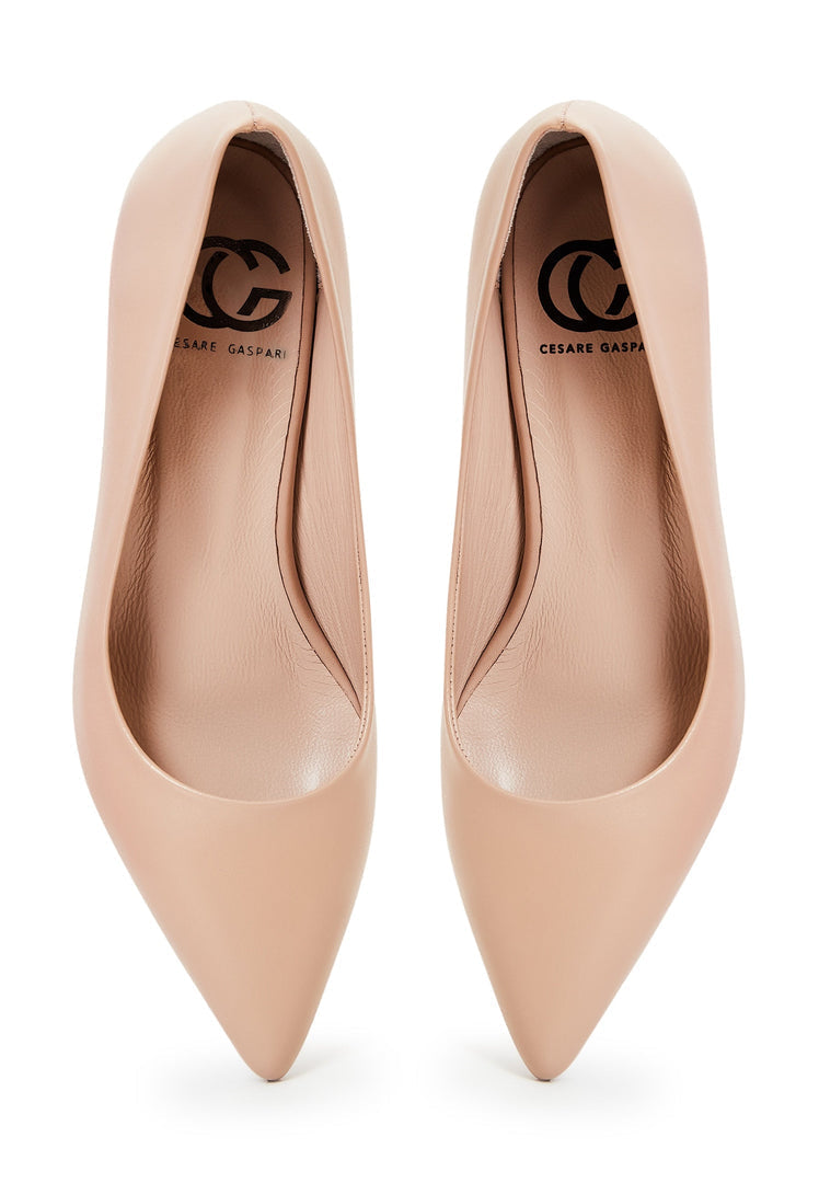 A pair of elegant beige designer heels - luxe shoes for a fashionable look.