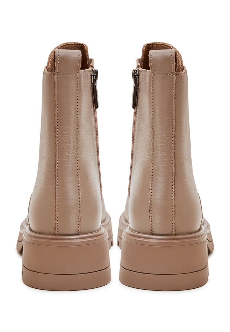 A stylish pair of women's brown lace-up ankle boots, perfect for any casual outfit. These fashionable boots are a must-have for any fashion footwear enthusiast.