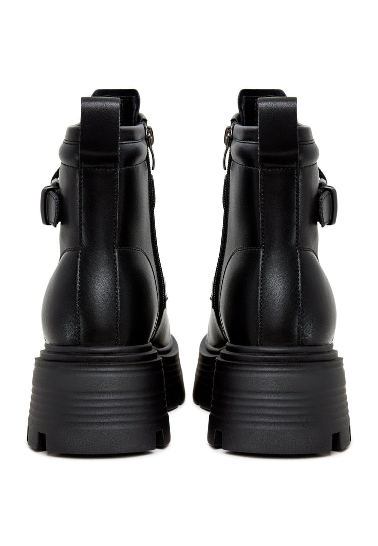 A fashionable pair of elegant black ankle boots with a stylish platform design for women.