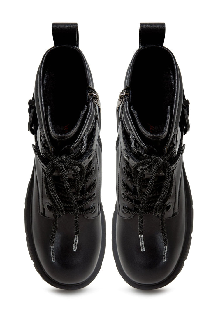 A stylish pair of black platform ankle boots, perfect for women looking for elegant and trendy footwear.
