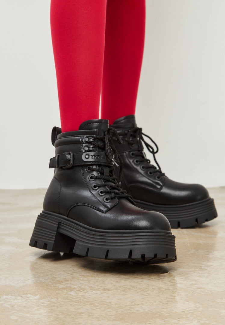 A pair of elegant black ankle boots with a stylish platform design for women.