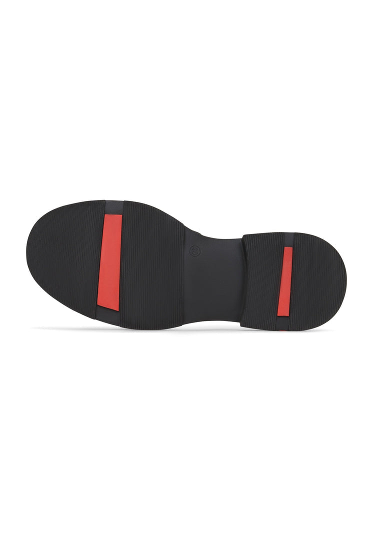 A stylish pair of black leather loafers for men inspired by rockstar fashion trends in men's fashion footwear style.