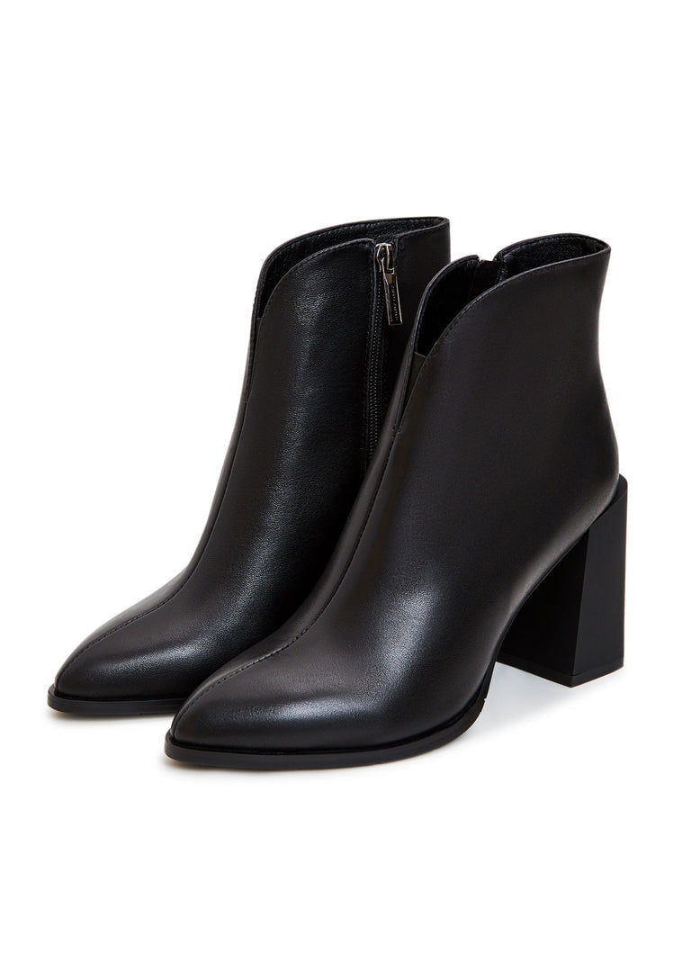 A pair of fashionable women's leather ankle boots featuring a stylish block heel in classic black.