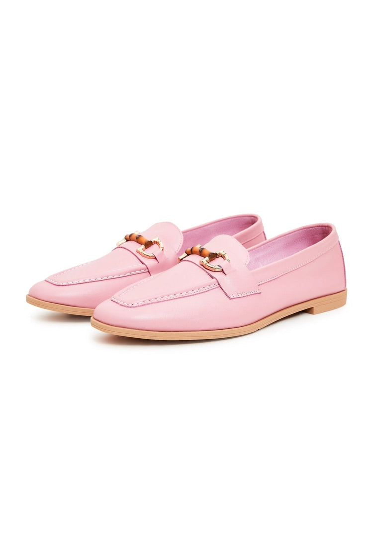 A fashionable pair of designer leather loafers in a stylish pink color, perfect for women looking for high-quality shoes.