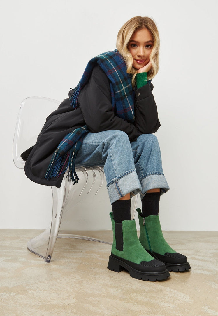 Stylish green urban platform ankle boots for women, the ultimate fashionable footwear.
