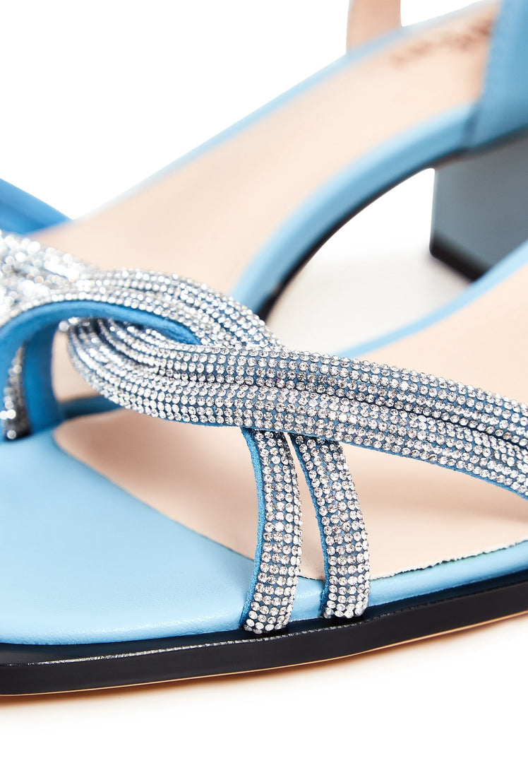 A stylish pair of blue leather open toe block heel sandals known as the Andrea sandals.