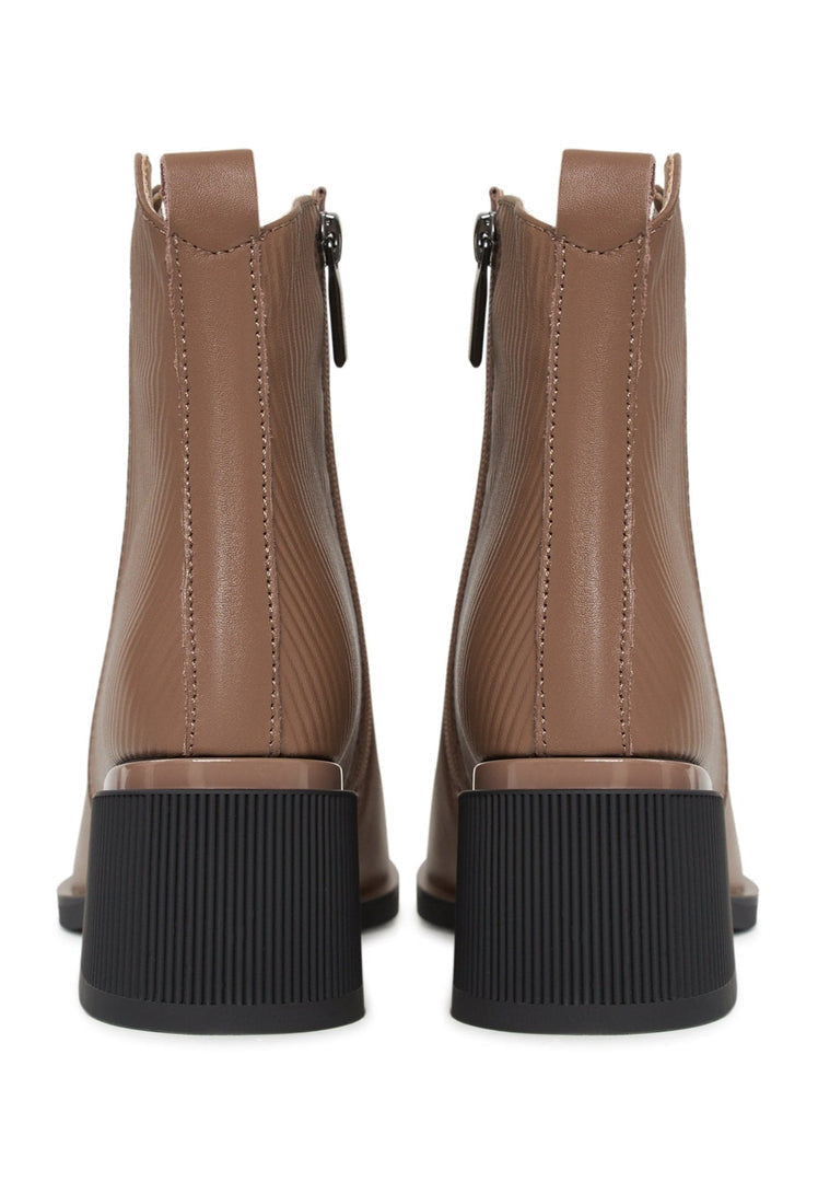 A pair of stylish brown leather women's ankle boots, perfect for a casual and chic look.
