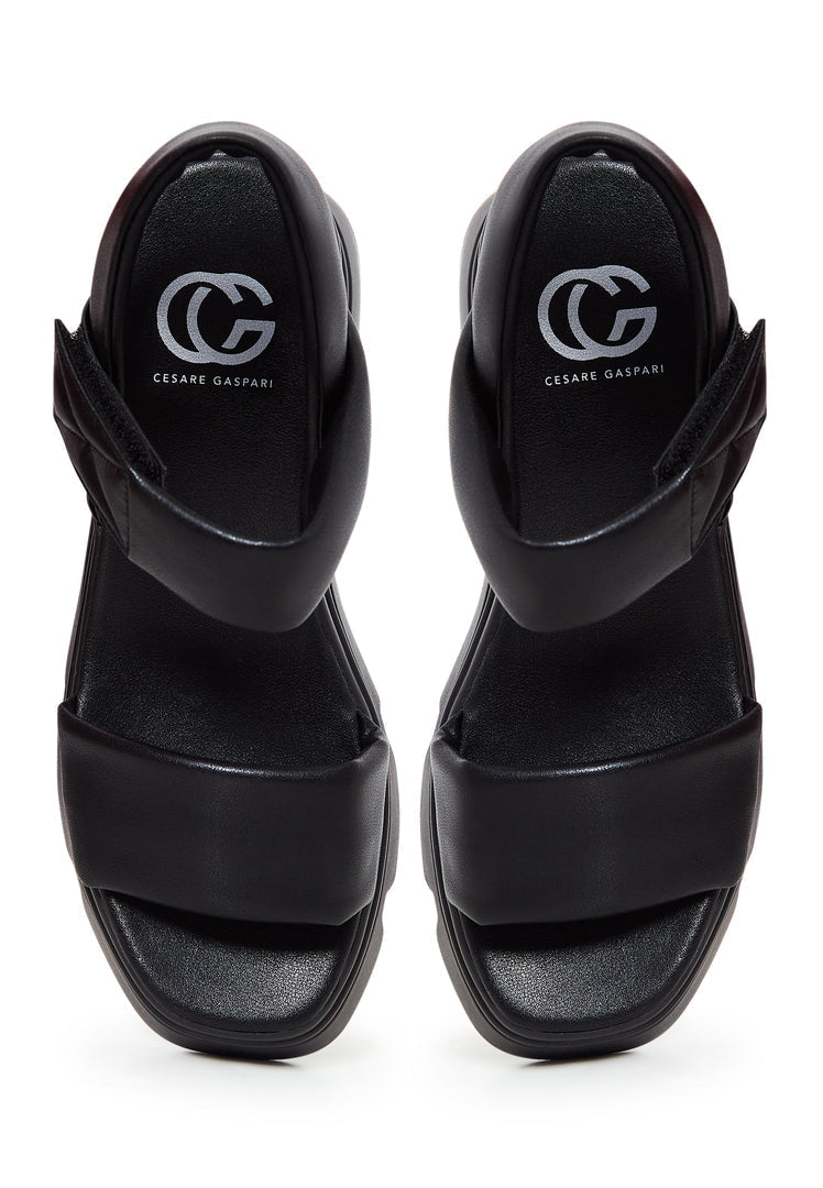 A trendy pair of urban leather platform sandals perfect for city adventures.