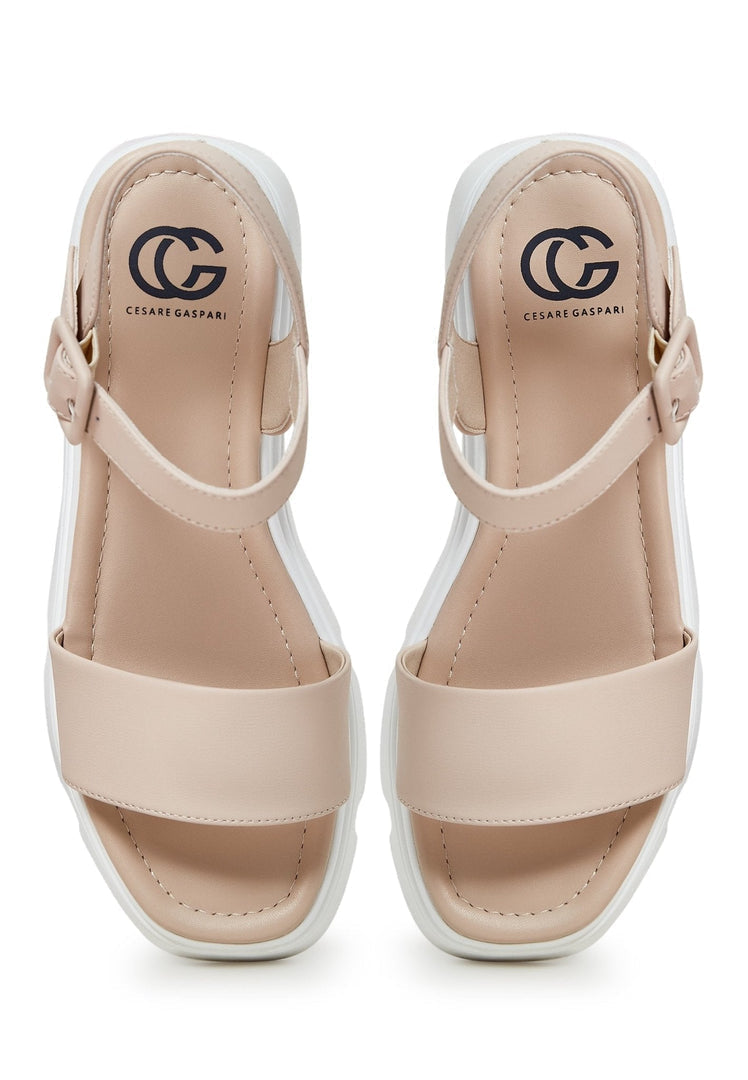 A stylish pair of leather platform sandals, perfect for urban wear, combining the comfort of platform design with the elegance of leather, making them a must-have in your collection of urban footwear.