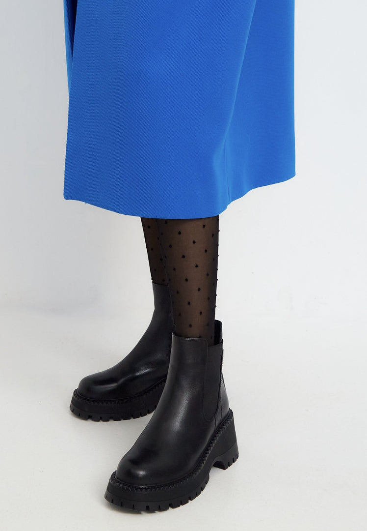 A stylish pair of black platform Chelsea boots for women, featuring a chunky design perfect for adding a statement to any outfit.