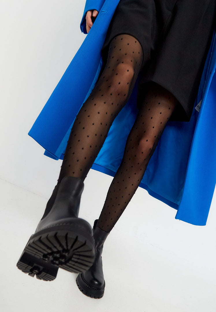 A pair of stylish black platform Chelsea boots for women, featuring a chunky design that adds a bold and trendy touch to any outfit.
